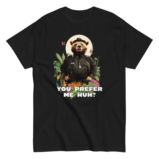 The FunnyDripStore You Prefer Me Huh? T-Shirt in black shows a bear in human clothes and a hat, surrounded by plants and flowers, with YOU PREFER ME HUH? below. Great for anyone who loves playful vibes and funny clothing.