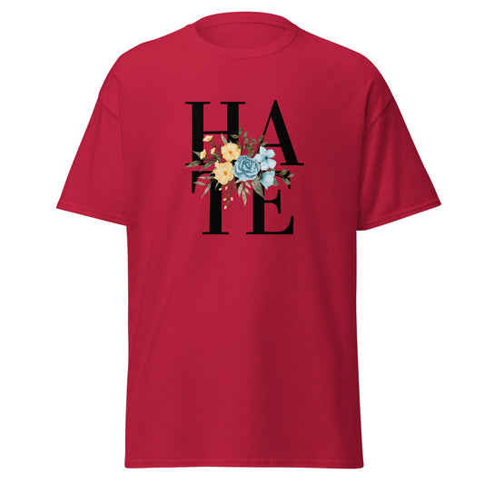 The Hate T-Shirt by FunnyDripStore features HATE in bold black text on white, overlaid with yellow and blue flowers plus green leaves—a unique, funny shirt designed to spark conversation.