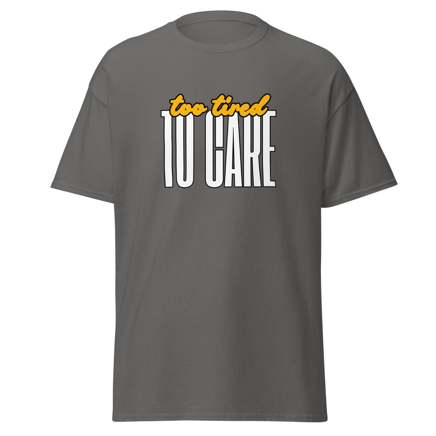 The FunnyDripStore Too Tired To Care T-Shirt in charcoal features too tired in yellow cursive above bold white TO CARE, making this meme shirt funny and ideal for relaxed days.