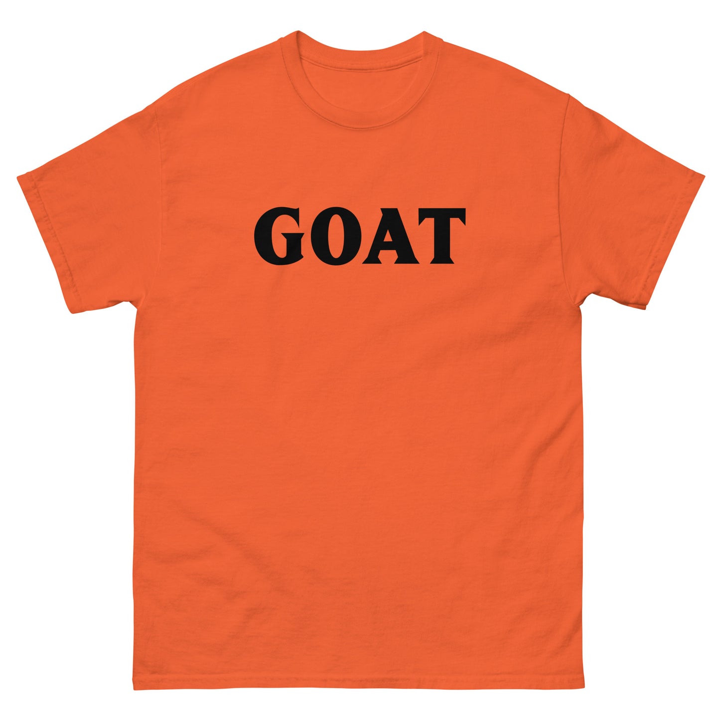 The GOAT T-Shirt by FunnyDripStore is a plain white tee with GOAT in bold, black letters across the chest—an ideal meme shirt for fans of funny clothing.