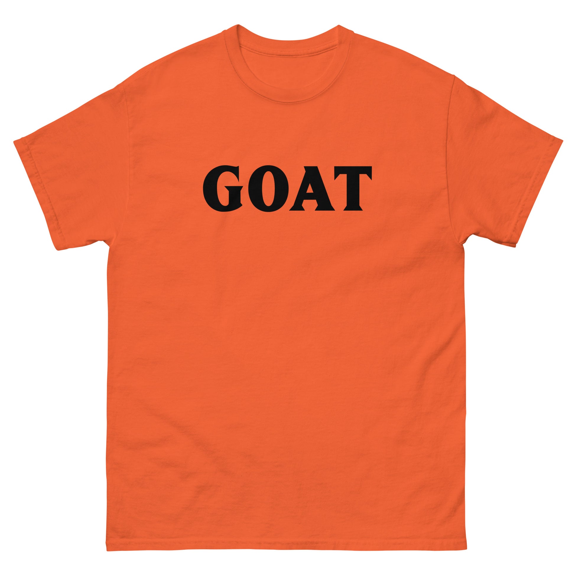The GOAT T-Shirt by FunnyDripStore is a plain white tee with GOAT in bold, black letters across the chest—an ideal meme shirt for fans of funny clothing.