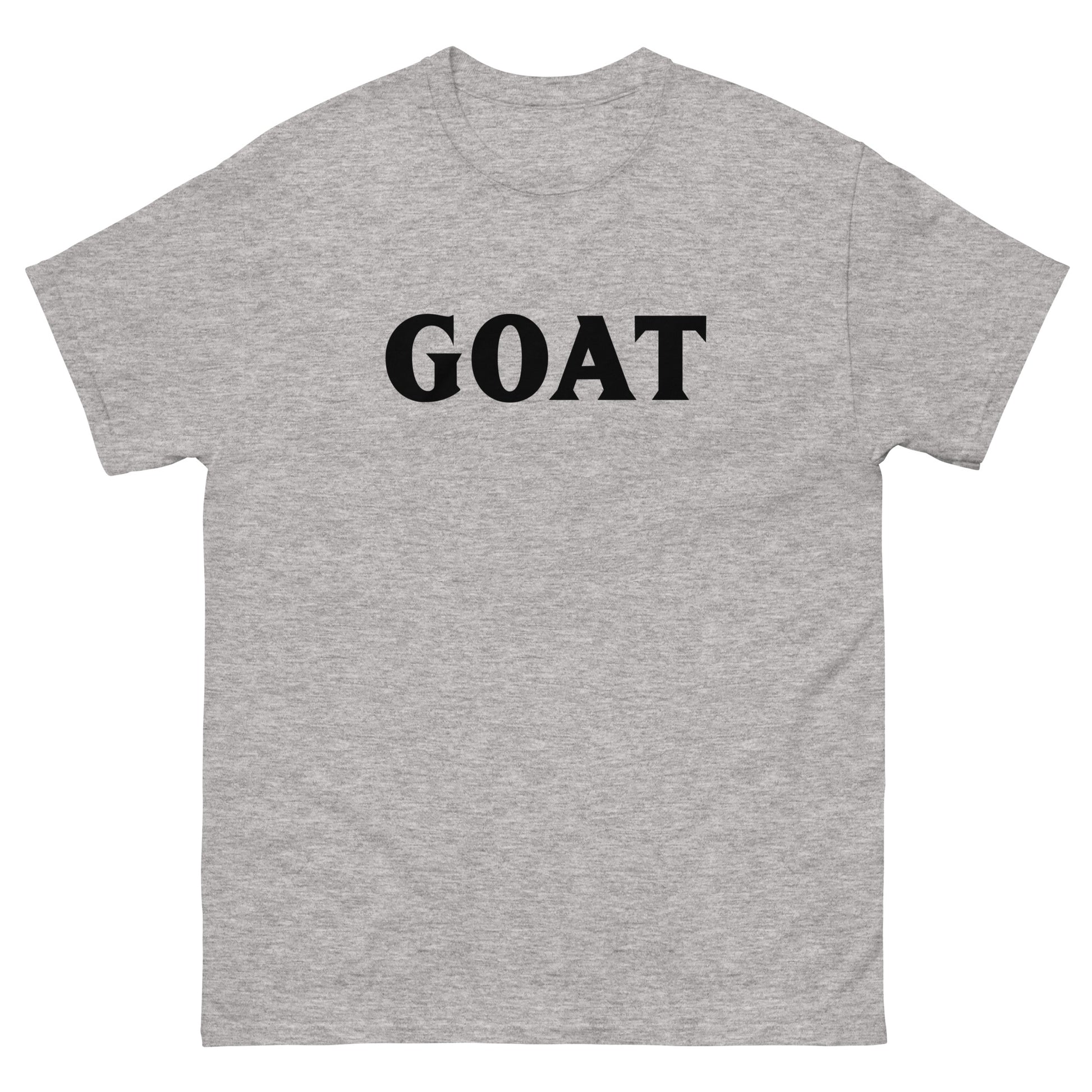 The GOAT T-Shirt by FunnyDripStore is a plain white tee with GOAT in bold, black letters across the chest—an ideal meme shirt for fans of funny clothing.