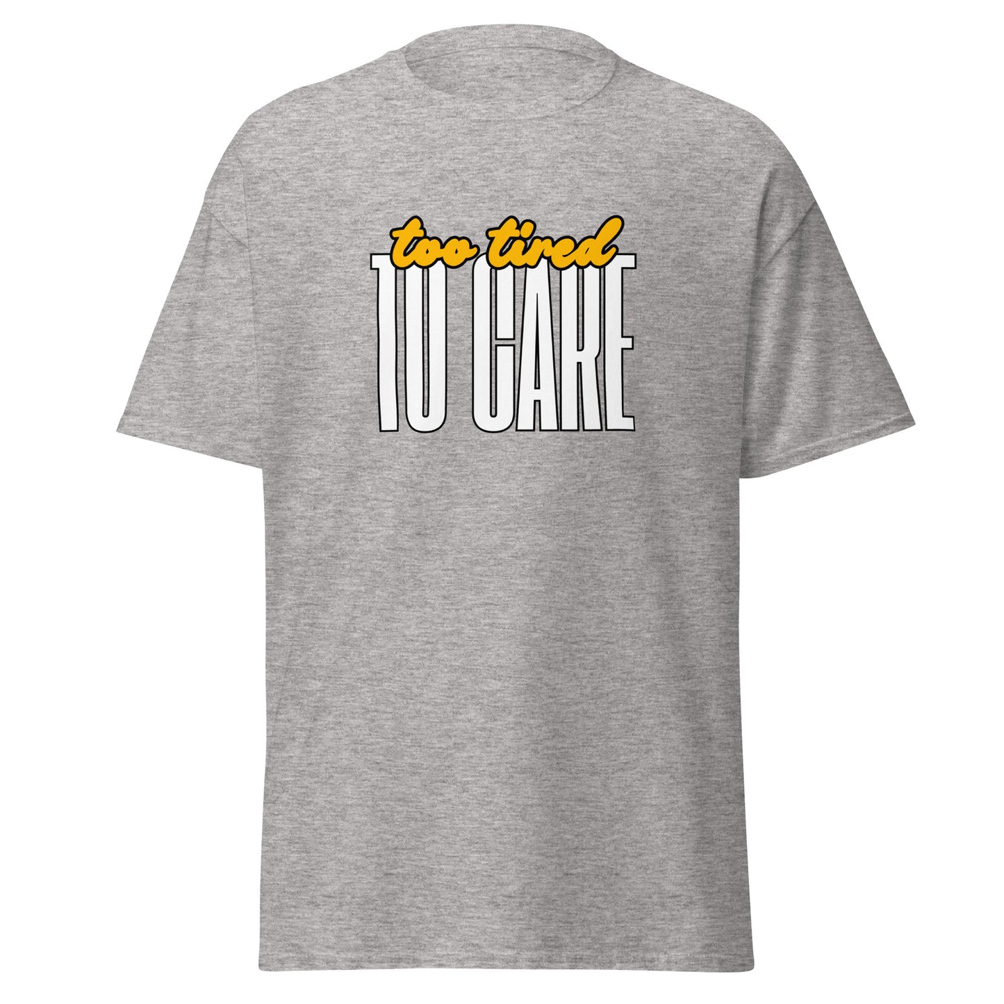 The FunnyDripStore Too Tired To Care T-Shirt in charcoal features too tired in yellow cursive above bold white TO CARE, making this meme shirt funny and ideal for relaxed days.