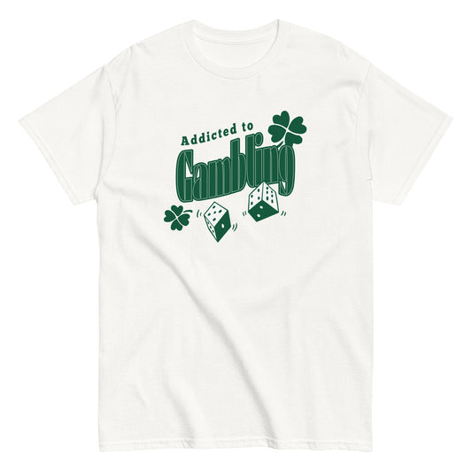 The Addicted To Gambling T-Shirt by FunnyDripStore is a white tee with green Addicted to Gambling lettering, two dice, and three shamrocks—a hilarious choice for meme shirt fans.