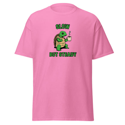 The FunnyDripStore Slow But Steady T-Shirt is a black tee with a cartoon turtle holding a coffee mug and SLOW above and BUT STEADY below in green—perfect meme shirt for coffee lovers.