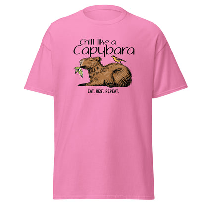 Chill Like A Capybara T-Shirt by FunnyDripStore: White tee with a relaxed capybara and bird eating a leaf, captioned “Chill like a Capybara” above and “Eat, rest, repeat” below. Perfect funny shirt for laid-back meme lovers!.