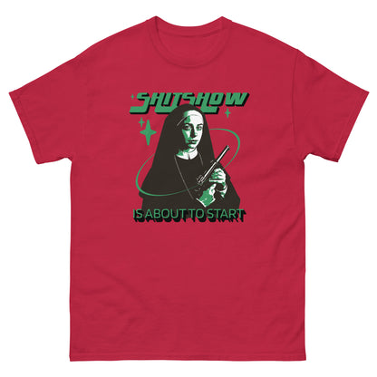 The Shitshow T-Shirt by FunnyDripStore features a nun with a gun, green stars, and bold “SHITSHOW” and “IS ABOUT TO START” text—an edgy, funny tee perfect for humor lovers.