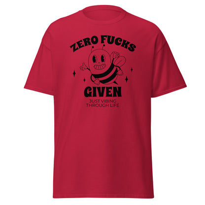 The Zero F*cks Given T-Shirt by FunnyDripStore features a smiling cartoon bee with raised arms, black sparkles, and ZERO F*CKS GIVEN plus JUST VIBING THROUGH LIFE—a perfect funny shirt for meme lovers.