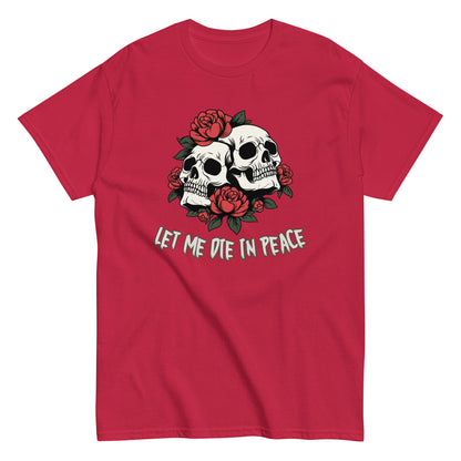 The Let Me Die In Peace T-Shirt by FunnyDripStore is a black tee with two white skulls, red roses, green leaves, and LET ME DIE IN PEACE below—ideal for fans of darkly humorous merch.