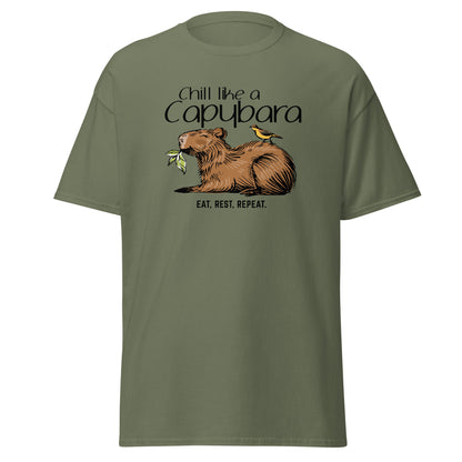 Chill Like A Capybara T-Shirt by FunnyDripStore: White tee with a relaxed capybara and bird eating a leaf, captioned “Chill like a Capybara” above and “Eat, rest, repeat” below. Perfect funny shirt for laid-back meme lovers!.
