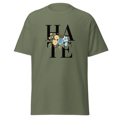 The Hate T-Shirt by FunnyDripStore features HATE in bold black text on white, overlaid with yellow and blue flowers plus green leaves—a unique, funny shirt designed to spark conversation.