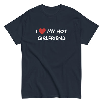 The I Love My Hot Girlfriend T-Shirt by FunnyDripStore features bold white lettering and a red heart on a purple shirt—a fun, standout choice for anyone who loves quirky and eye-catching clothing.