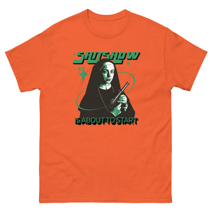 The Shitshow T-Shirt by FunnyDripStore features a nun with a gun, green stars, and bold “SHITSHOW” and “IS ABOUT TO START” text—an edgy, funny tee perfect for humor lovers.
