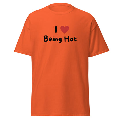 The I Love Being Hot T-Shirt by FunnyDripStore features bold I ♥ Being Hot text with a red heart, making it a playful meme shirt for those who love stylish, funny designs.