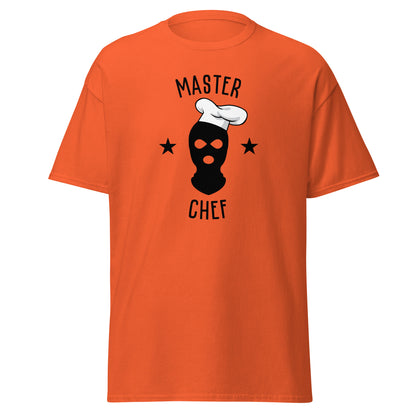The Master Chef T-Shirt by FunnyDripStore features a black ski mask in a chef’s hat, two black stars, and bold “MASTER CHEF” text above and below the graphic.
