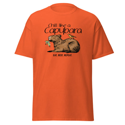 Chill Like A Capybara T-Shirt by FunnyDripStore: White tee with a relaxed capybara and bird eating a leaf, captioned “Chill like a Capybara” above and “Eat, rest, repeat” below. Perfect funny shirt for laid-back meme lovers!.
