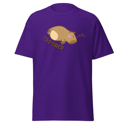 The Too Tired T-Shirt by FunnyDripStore is a white tee with a cute cartoon capybara sleeping on its side and TOO TIRED text—ideal for fans of funny clothing and charming, sleepy vibes.