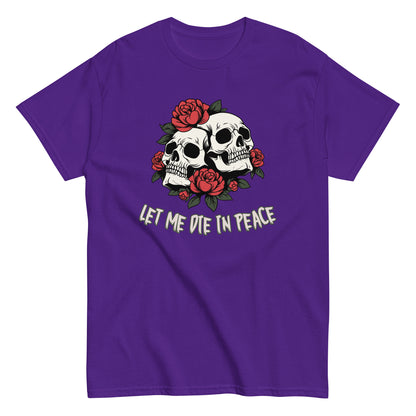 The Let Me Die In Peace T-Shirt by FunnyDripStore is a black tee with two white skulls, red roses, green leaves, and LET ME DIE IN PEACE below—ideal for fans of darkly humorous merch.