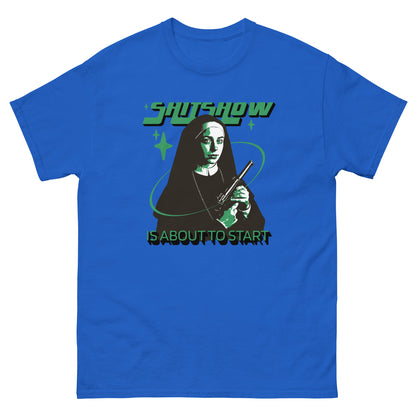 The Shitshow T-Shirt by FunnyDripStore features a nun with a gun, green stars, and bold “SHITSHOW” and “IS ABOUT TO START” text—an edgy, funny tee perfect for humor lovers.