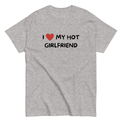 The I Love My Hot Girlfriend T-Shirt by FunnyDripStore features bold white lettering and a red heart on a purple shirt—a fun, standout choice for anyone who loves quirky and eye-catching clothing.