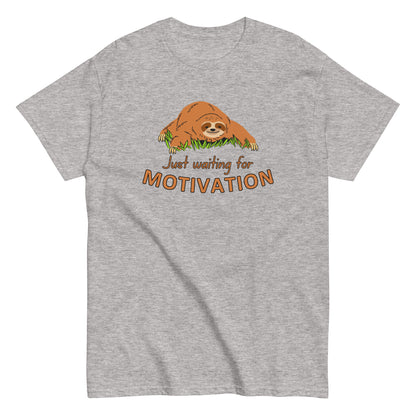 The Just Waiting For Motivation T-Shirt by FunnyDripStore features a smiling sloth on grass above bold orange and yellow text—a perfect choice for fans of funny apparel.