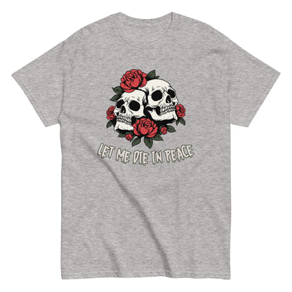 The Let Me Die In Peace T-Shirt by FunnyDripStore is a black tee with two white skulls, red roses, green leaves, and LET ME DIE IN PEACE below—ideal for fans of darkly humorous merch.