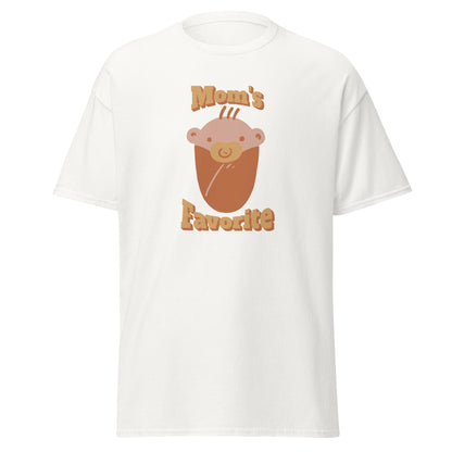 FunnyDripStore’s Moms Favorite T-Shirt in black features a cartoon baby face with a pacifier and “Moms Favorite” text in light brown—a playful, funny tee perfect for anyone who loves to show off their sense of humor!.