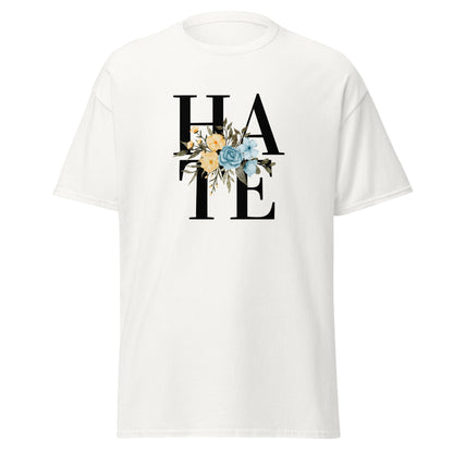 The Hate T-Shirt by FunnyDripStore features HATE in bold black text on white, overlaid with yellow and blue flowers plus green leaves—a unique, funny shirt designed to spark conversation.