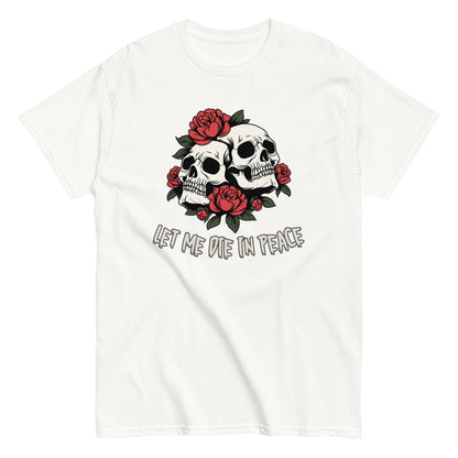 The Let Me Die In Peace T-Shirt by FunnyDripStore is a black tee with two white skulls, red roses, green leaves, and LET ME DIE IN PEACE below—ideal for fans of darkly humorous merch.